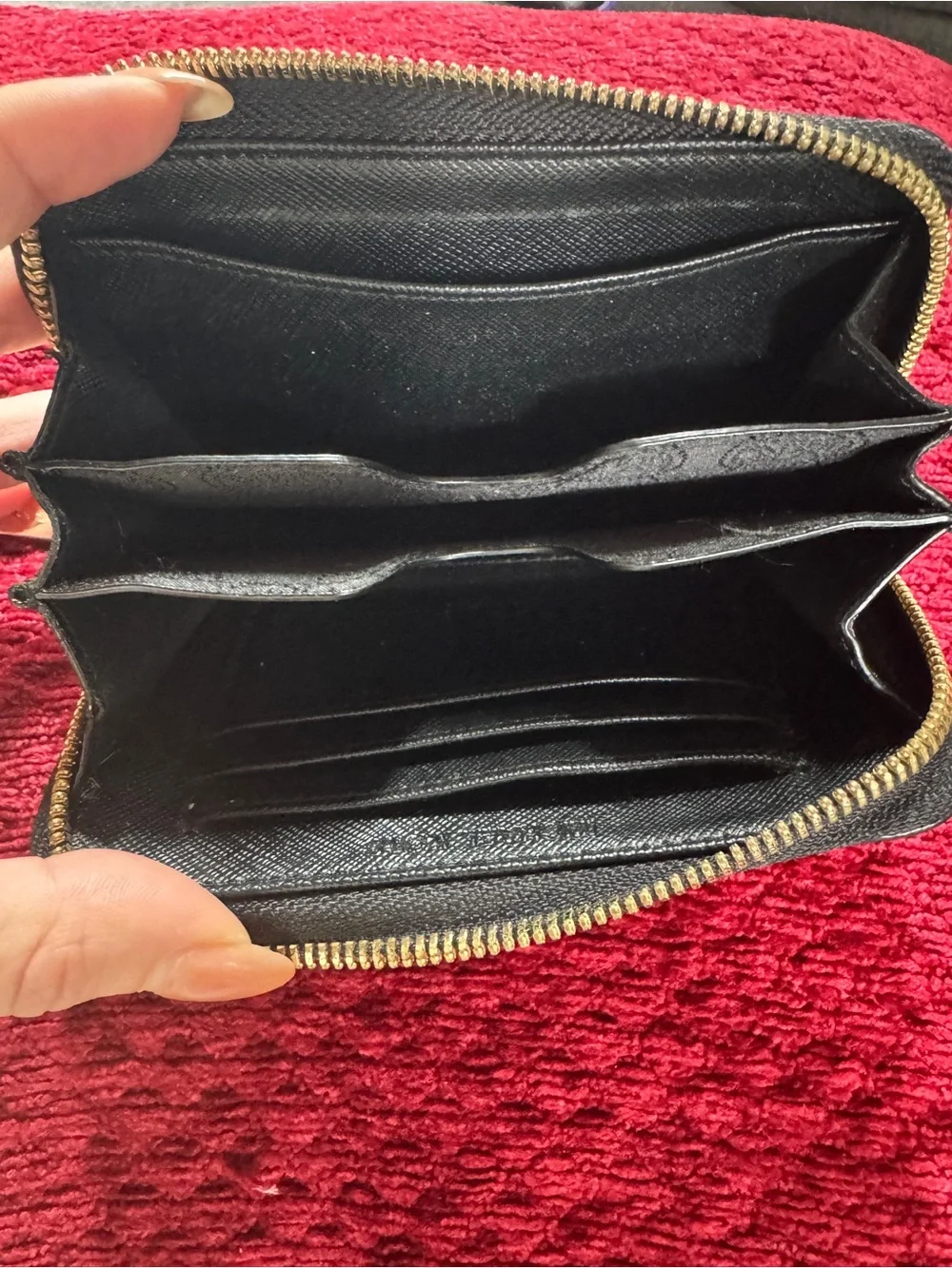 Michael Kors Black Leather Zip Wristlet with Gold Plaque